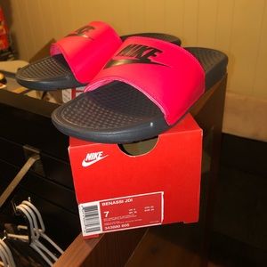 Red and black nike slides